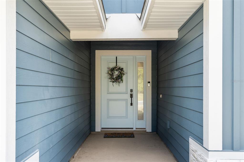 25093 Southwest 23rd Road Newberry, FL 32669 - Photo 3 of 29 a view of front door