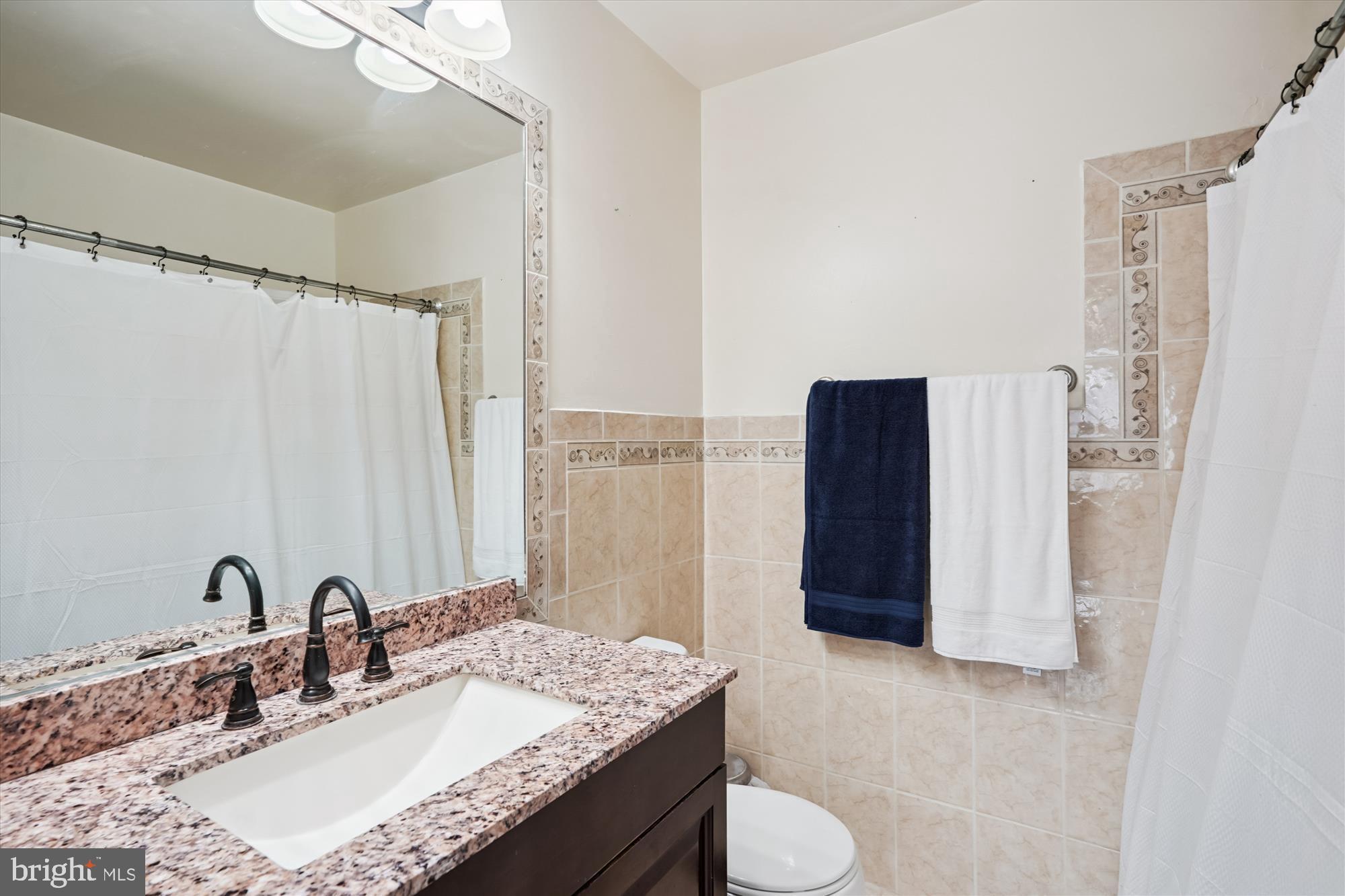 7410 Langholm Way Manassas, VA 20109 - Photo 16 of 18 Elegant bathroom with modern finishes.