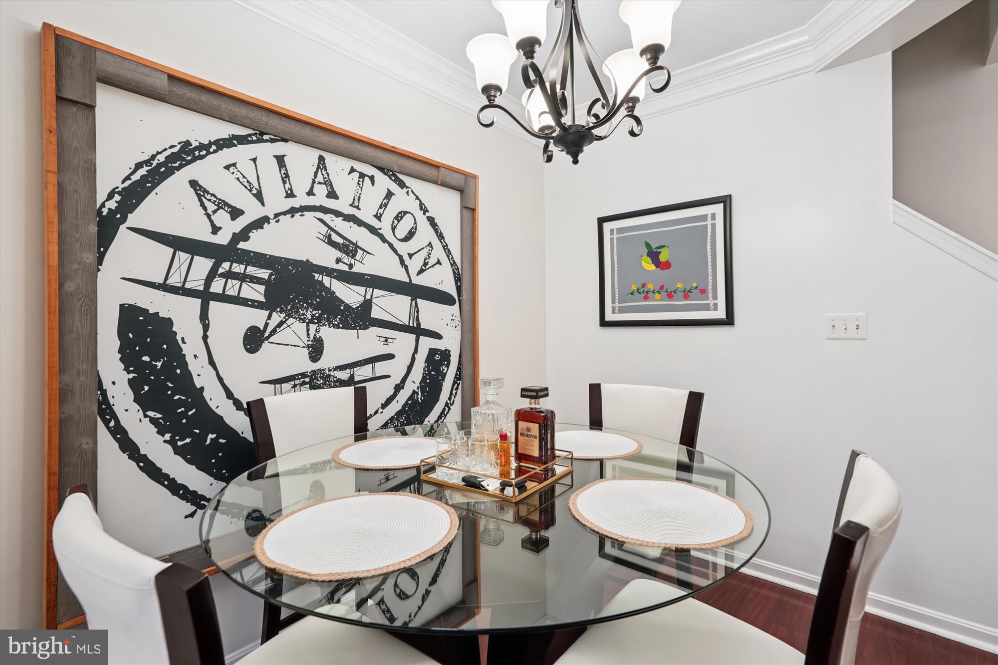 7410 Langholm Way Manassas, VA 20109 - Photo 5 of 18 Chic dining space with aviation flair.