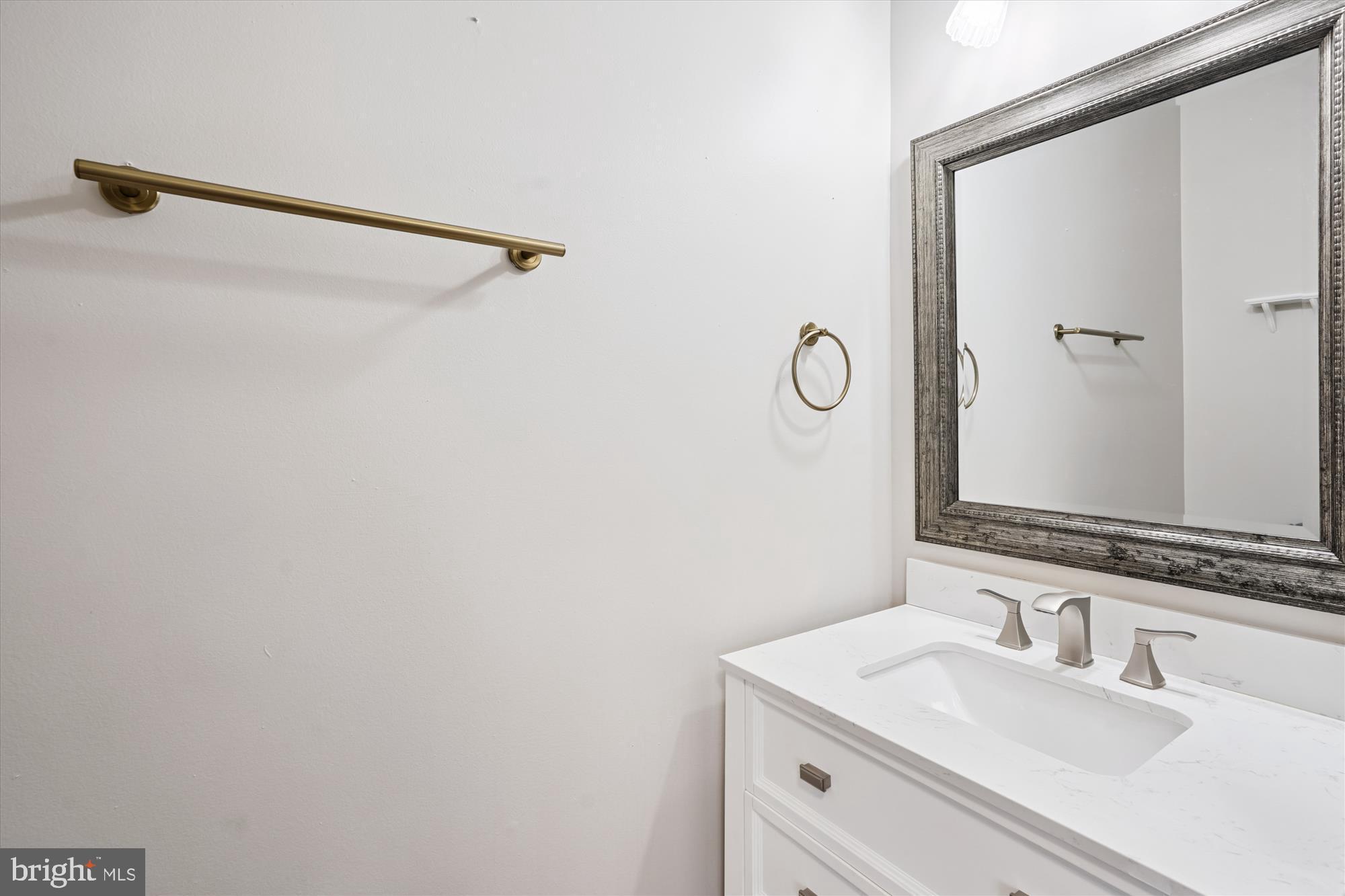 7410 Langholm Way Manassas, VA 20109 - Photo 9 of 18 Sleek bathroom with modern elegance.