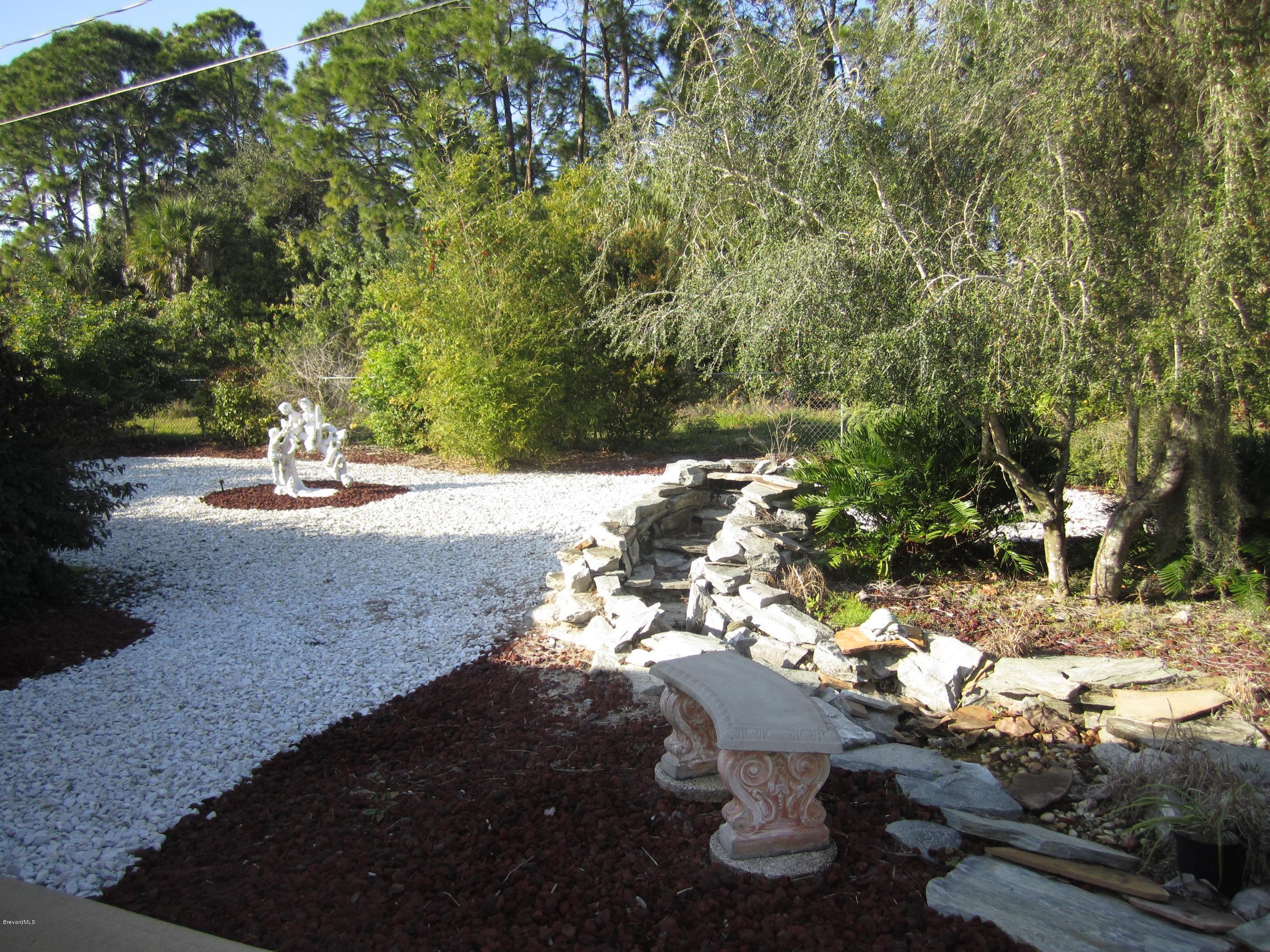 293 Abello Road Southeast Palm Bay, FL 32909 - Photo 14 of 15 Nicely Landscaped