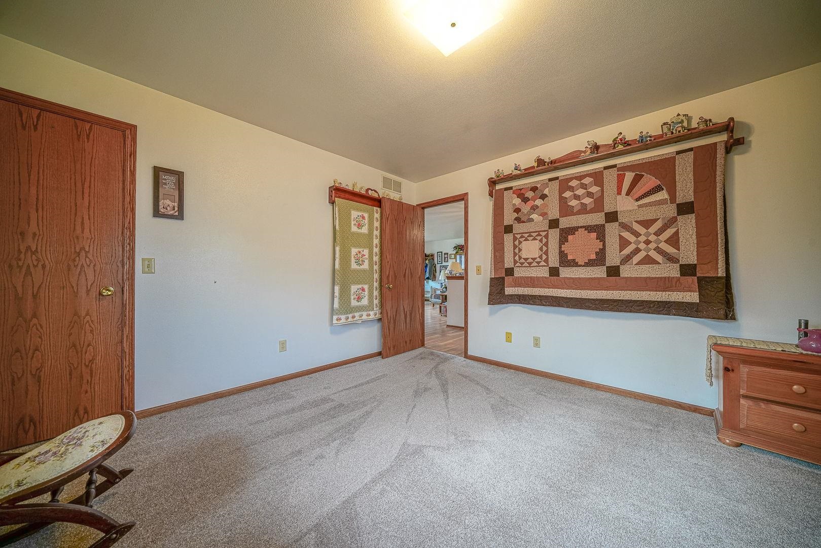 429 North Union Street Byron, IL 61010 - Photo 15 of 22 a view of an empty room with a window