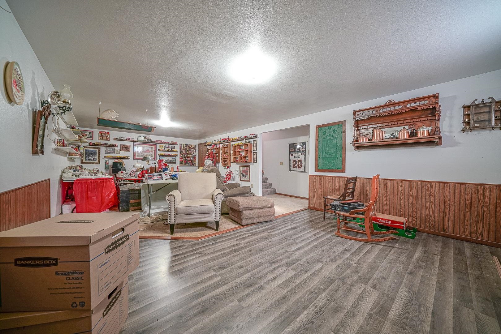 429 North Union Street Byron, IL 61010 - Photo 19 of 22 a living room with furniture and a wooden floor