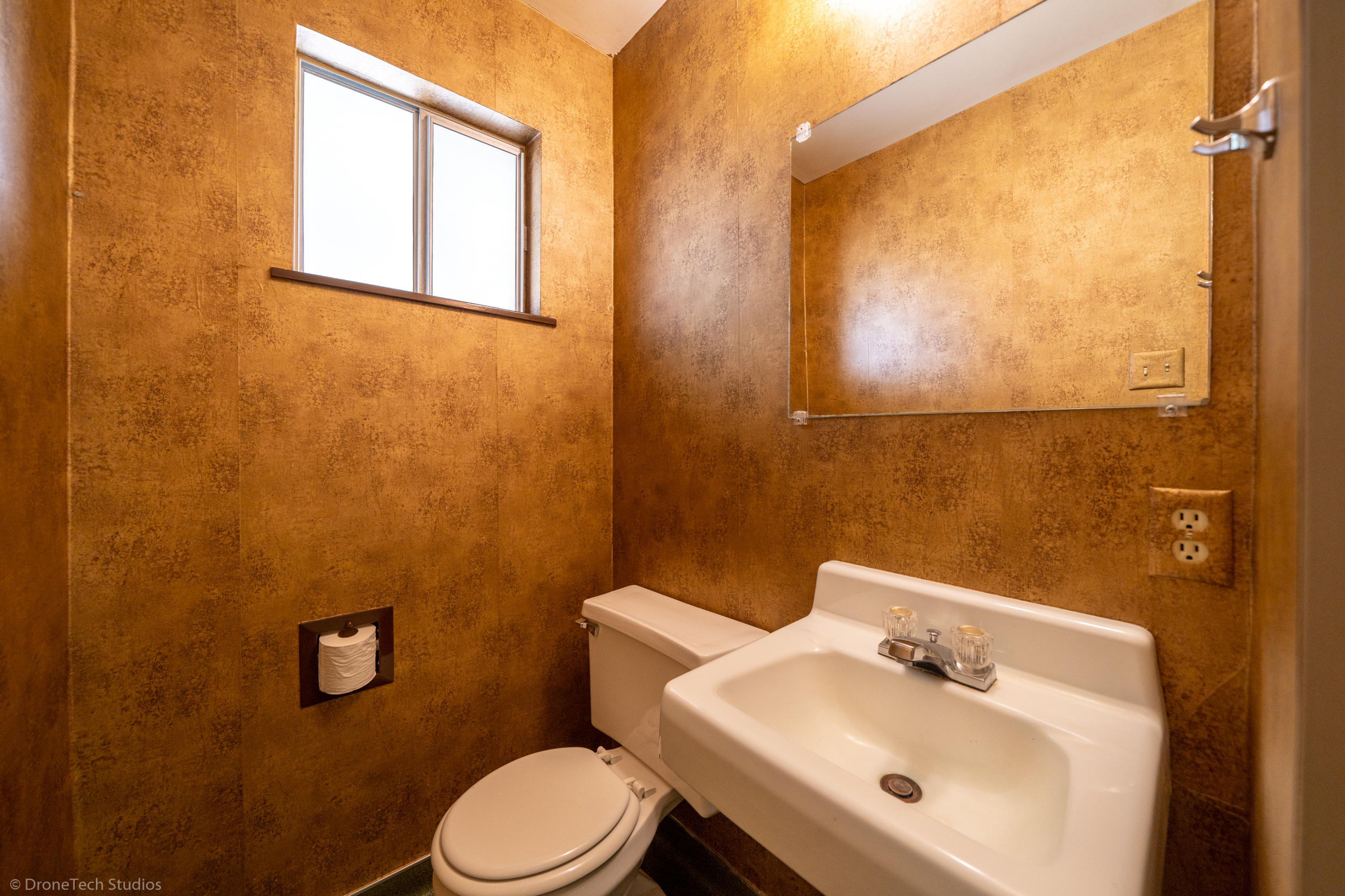 36563 Deer Flat Road Shingletown, CA 96088 - Photo 11 of 65 a bathroom with a sink mirror and toilet