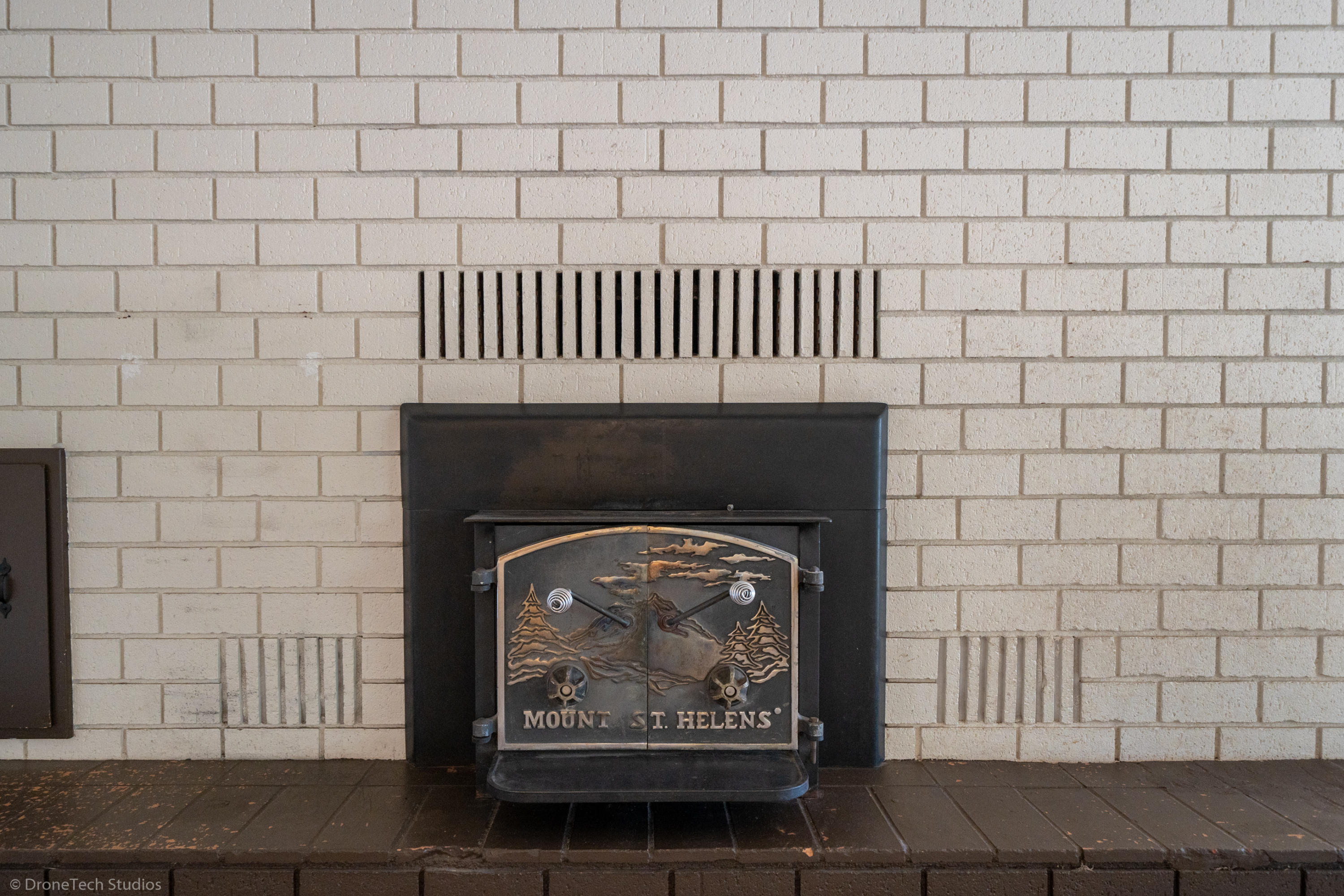 36563 Deer Flat Road Shingletown, CA 96088 - Photo 21 of 65 a closeup of a sink with a fireplace