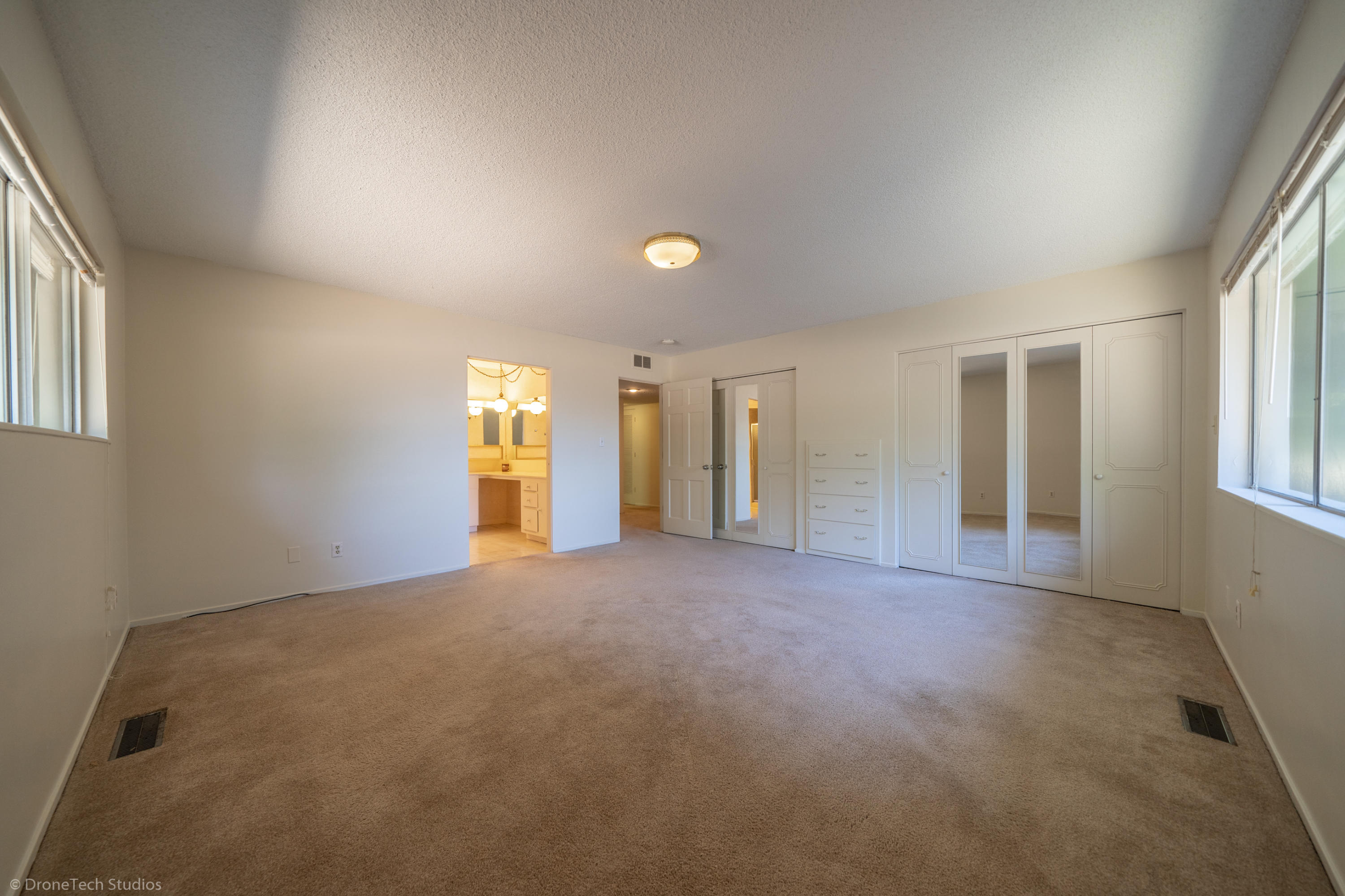 36563 Deer Flat Road Shingletown, CA 96088 - Photo 24 of 65 a view of empty room with windows