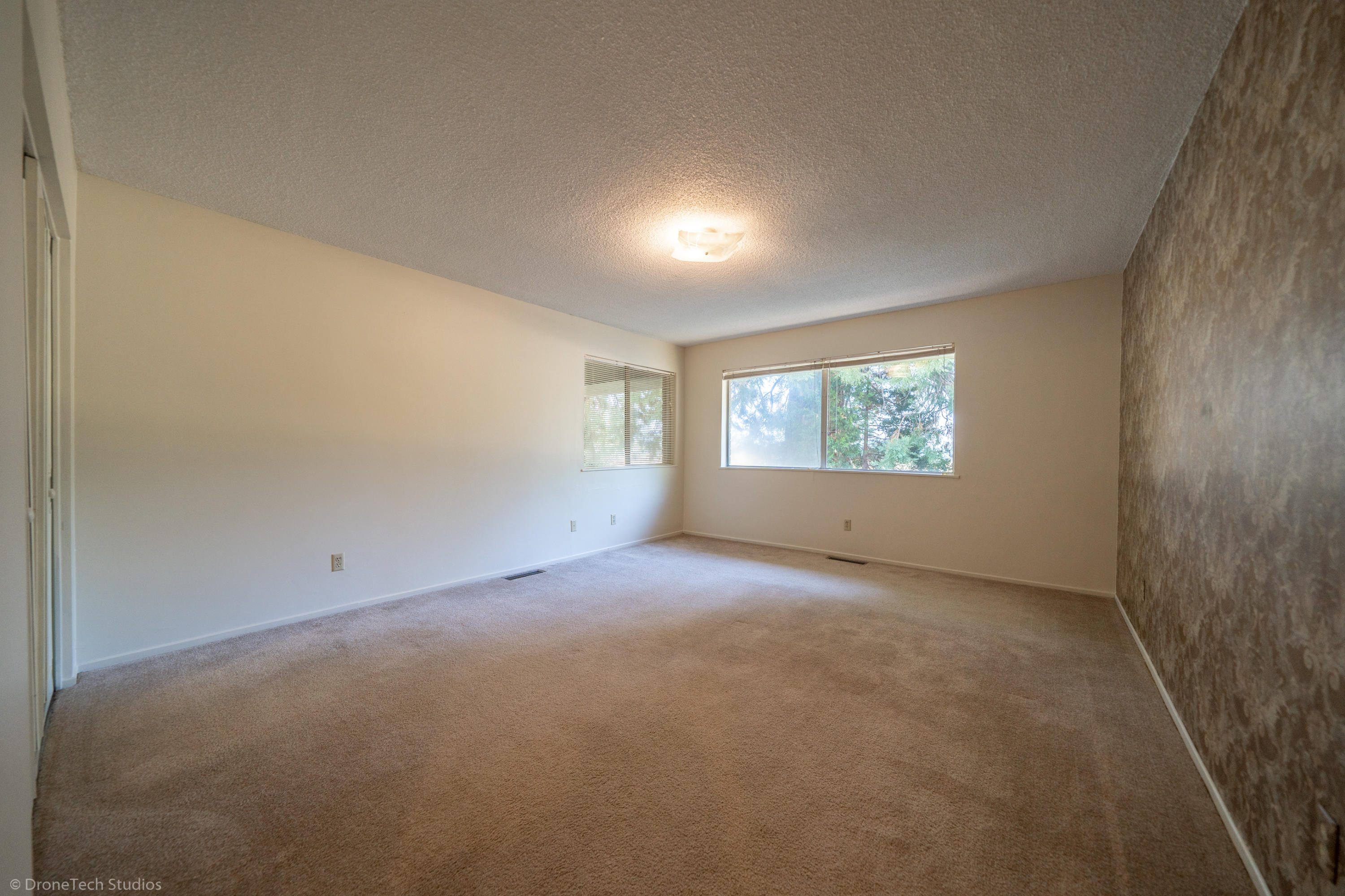 36563 Deer Flat Road Shingletown, CA 96088 - Photo 27 of 65 a view of an empty room with a window