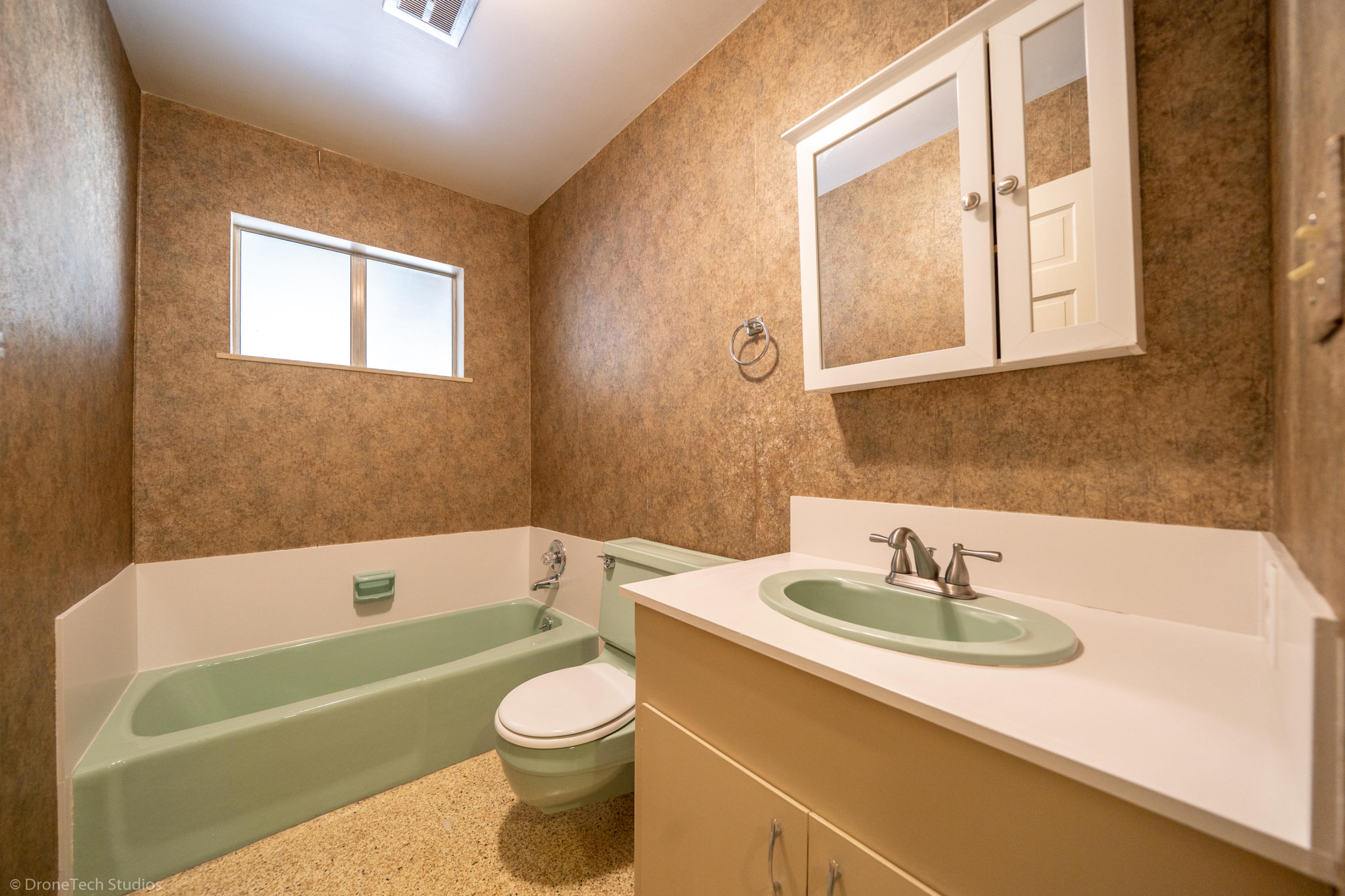 36563 Deer Flat Road Shingletown, CA 96088 - Photo 31 of 65 a bathroom with a sink a bathtub and a toilet