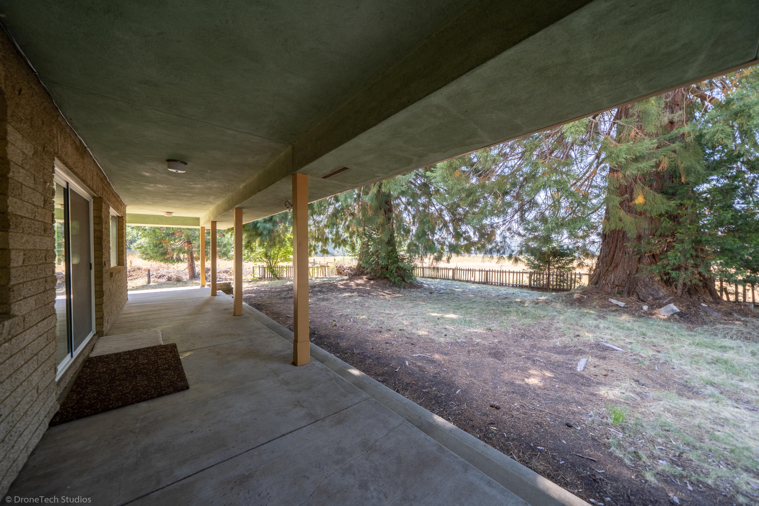 36563 Deer Flat Road Shingletown, CA 96088 - Photo 33 of 65 a view of a back yard of the house