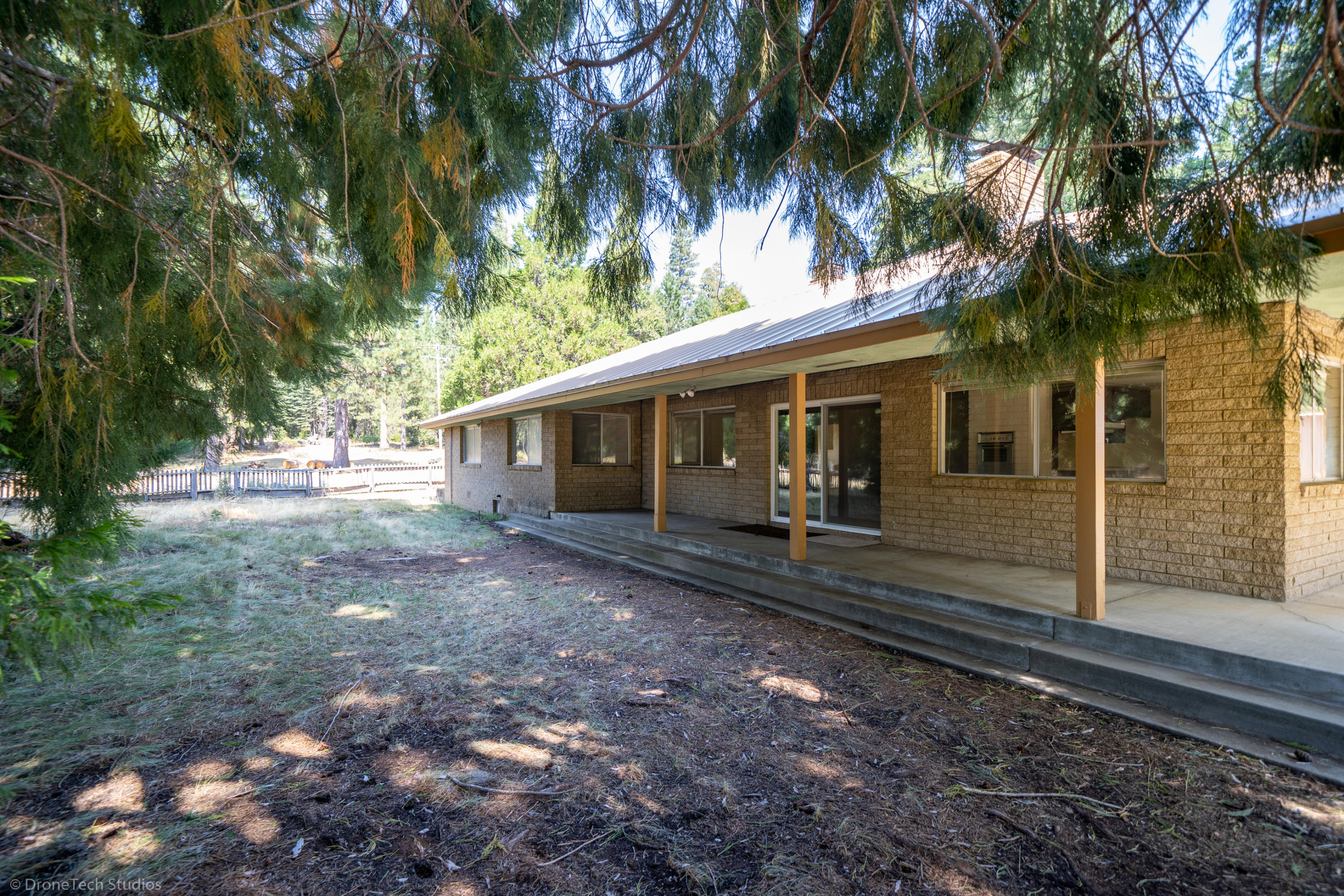 36563 Deer Flat Road Shingletown, CA 96088 - Photo 38 of 65 a view of a house with a yard
