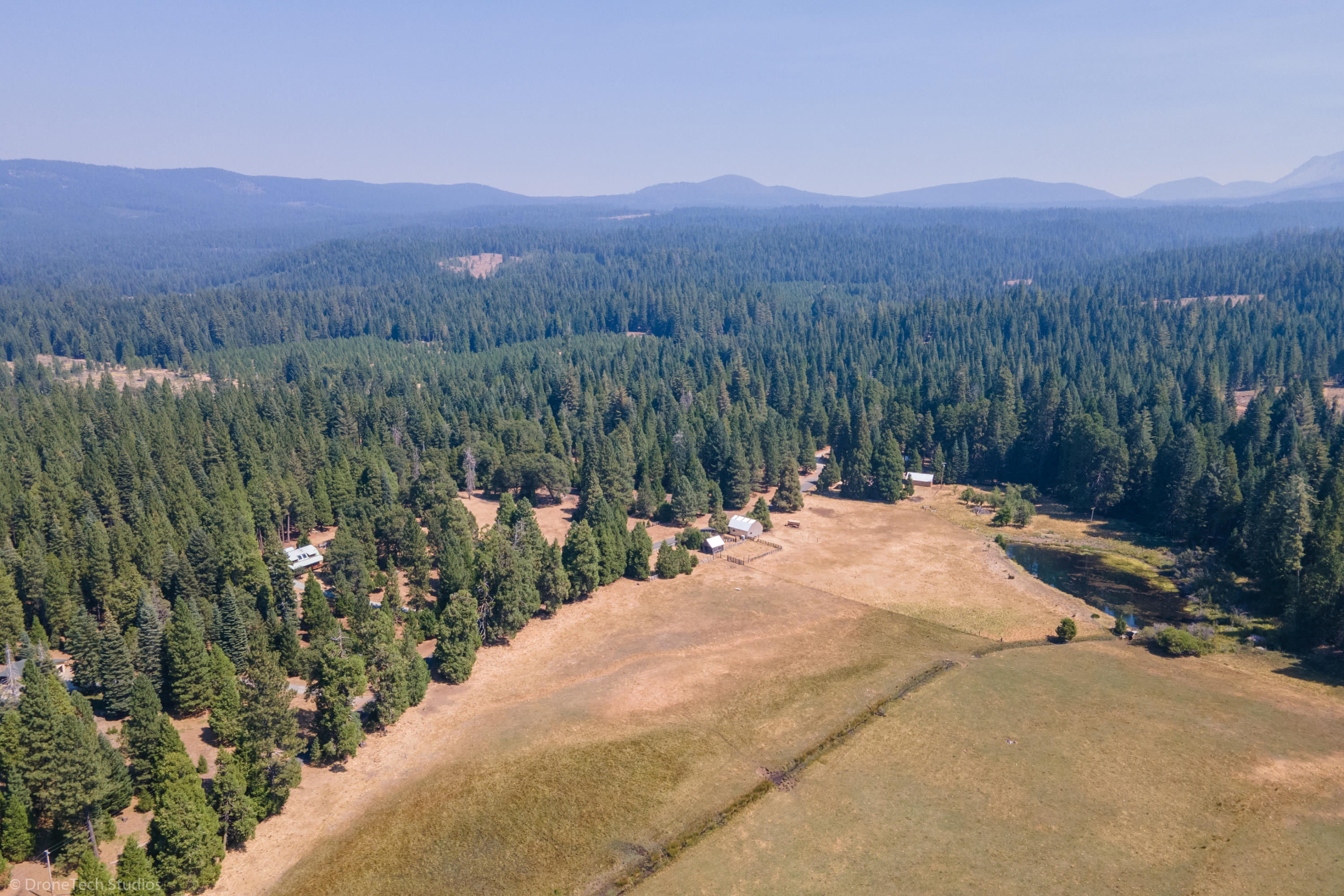 36563 Deer Flat Road Shingletown, CA 96088 - Photo 59 of 65 a view of a backyard of a house