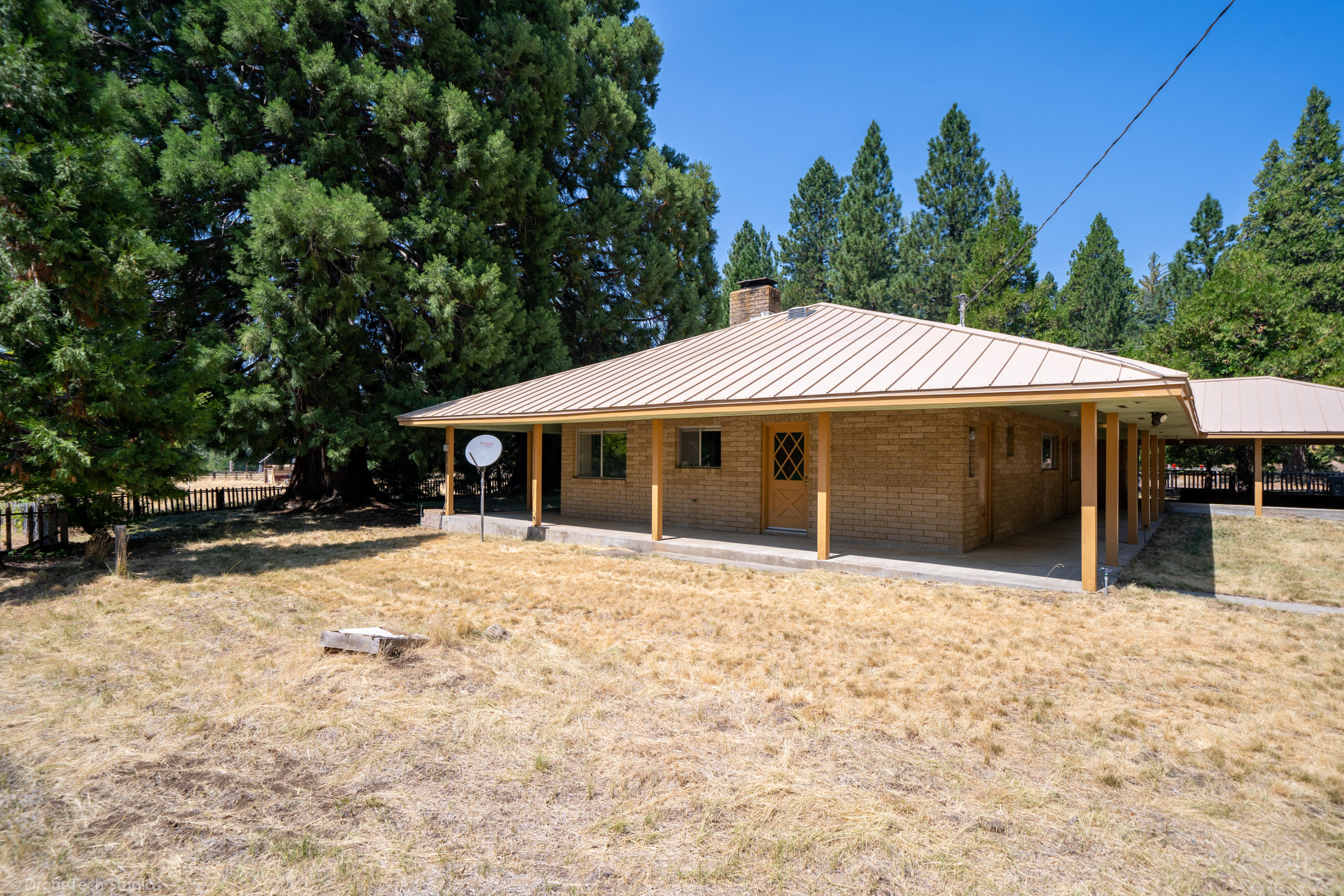 36563 Deer Flat Road Shingletown, CA 96088 - Photo 7 of 65 a front view of a house with a yard