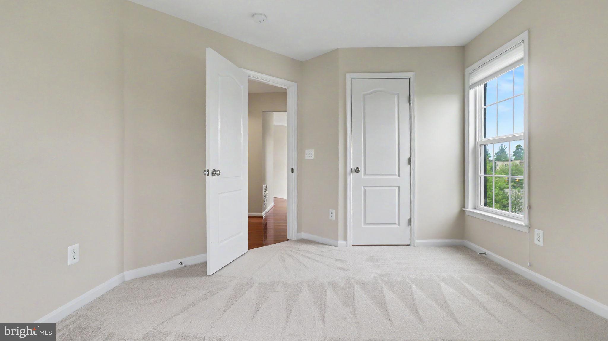 42371 Trellis Square Brambleton, VA 20148 - Photo 51 of 70 Bright and airy room with dual doors.