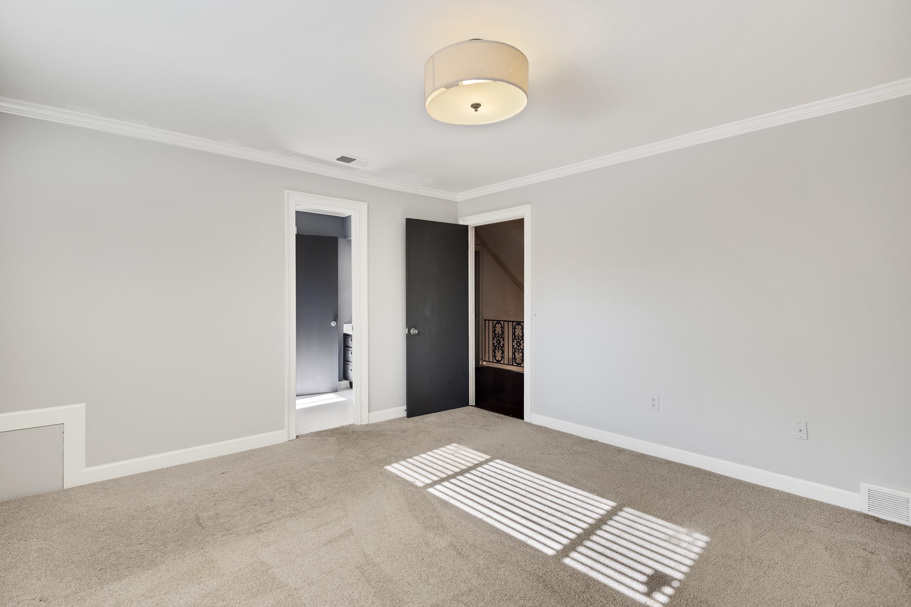 6867 River Birch Road Memphis, TN 38119 - Photo 31 of 40 Unfurnished room featuring ornamental molding and carpet floors
