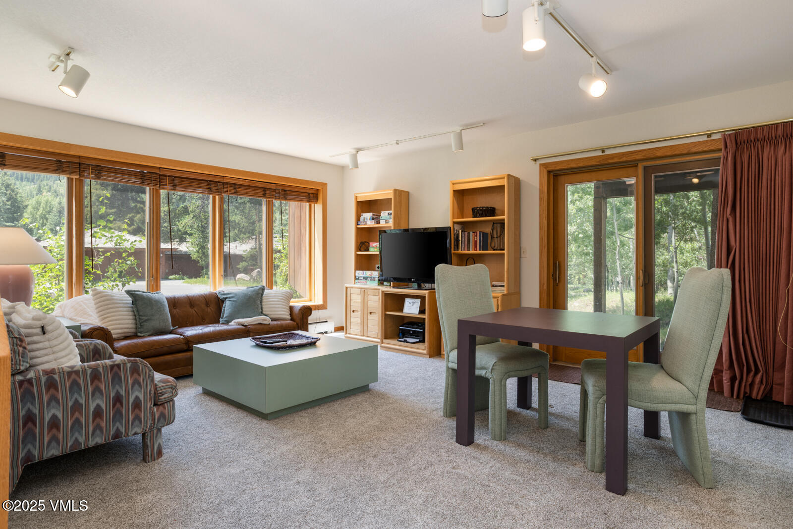 5159 Gore Circle Vail, CO 81657 - Photo 12 of 62 a living room with furniture and a flat screen tv