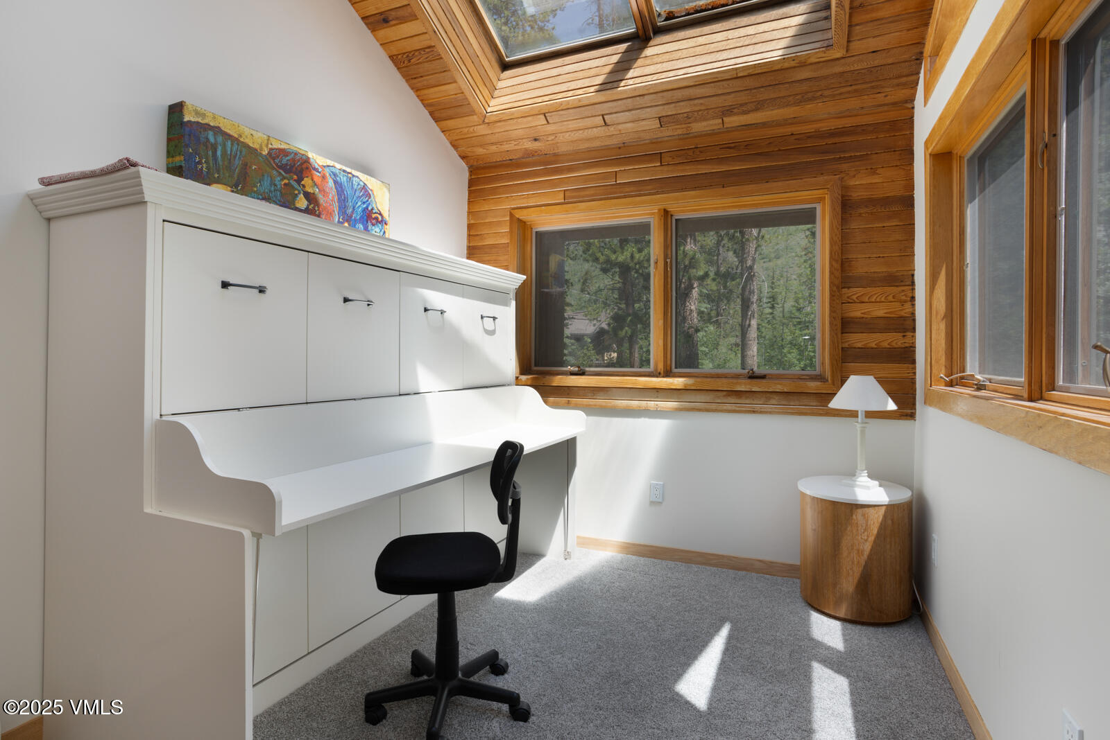 5159 Gore Circle Vail, CO 81657 - Photo 22 of 62 a living room with a couch and a table