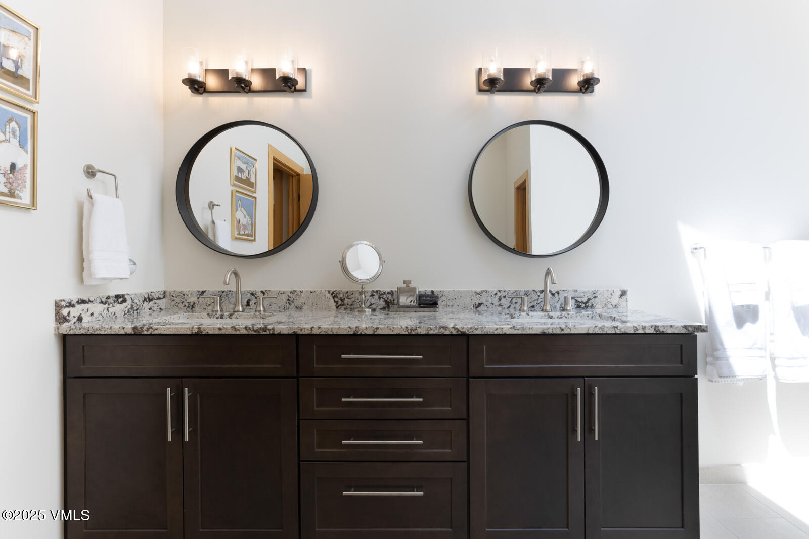5159 Gore Circle Vail, CO 81657 - Photo 25 of 62 a bathroom with a granite countertop sink and a mirror