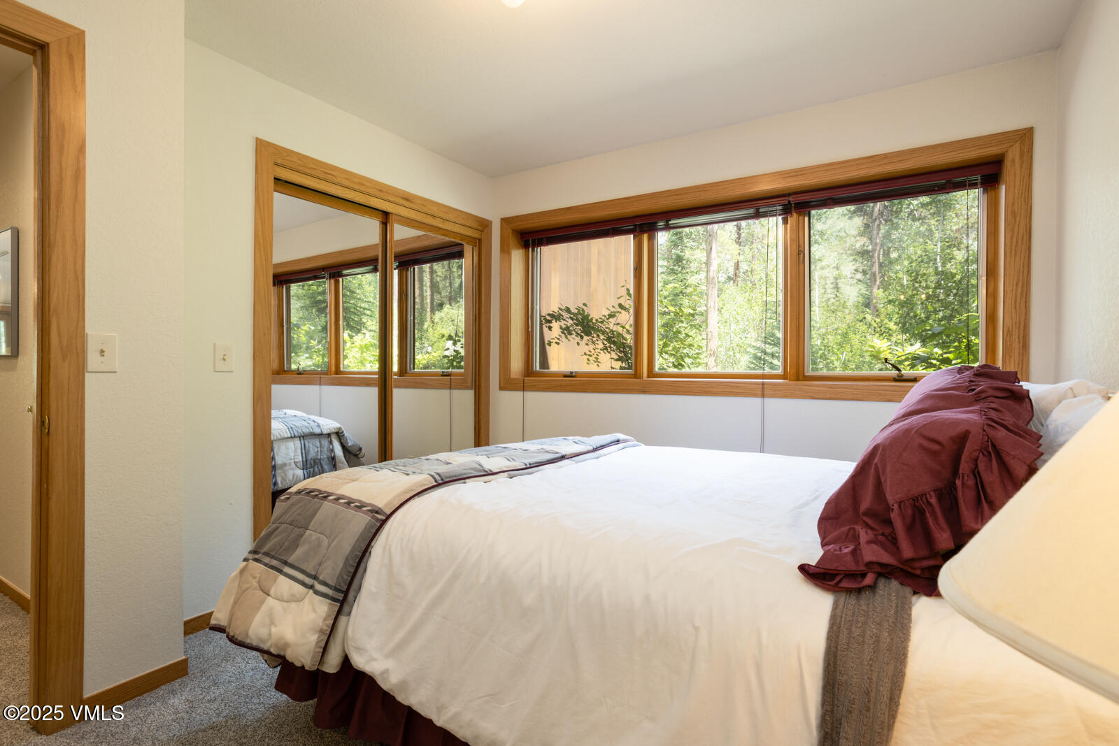 5159 Gore Circle Vail, CO 81657 - Photo 32 of 62 a bedroom with a bed and a large window