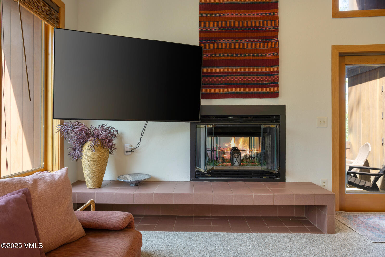 5159 Gore Circle Vail, CO 81657 - Photo 33 of 62 a living room with furniture and a fireplace
