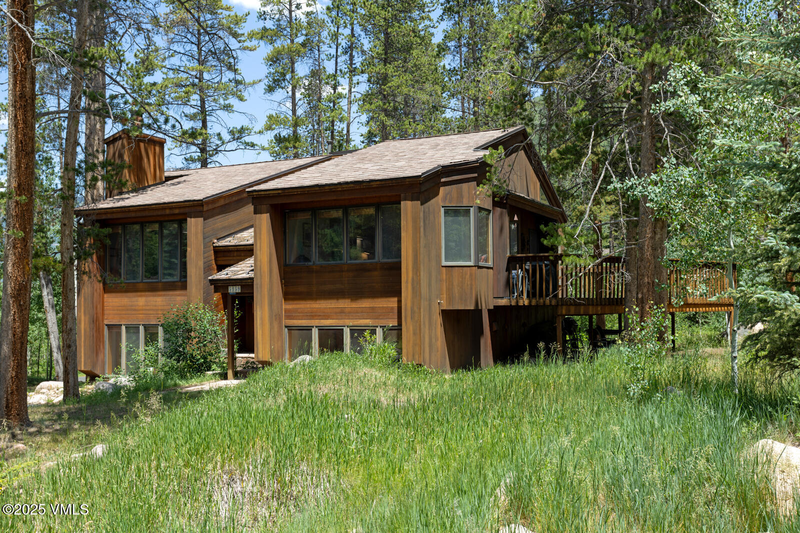 5159 Gore Circle Vail, CO 81657 - Photo 49 of 62 a backyard of a house with table and chairs