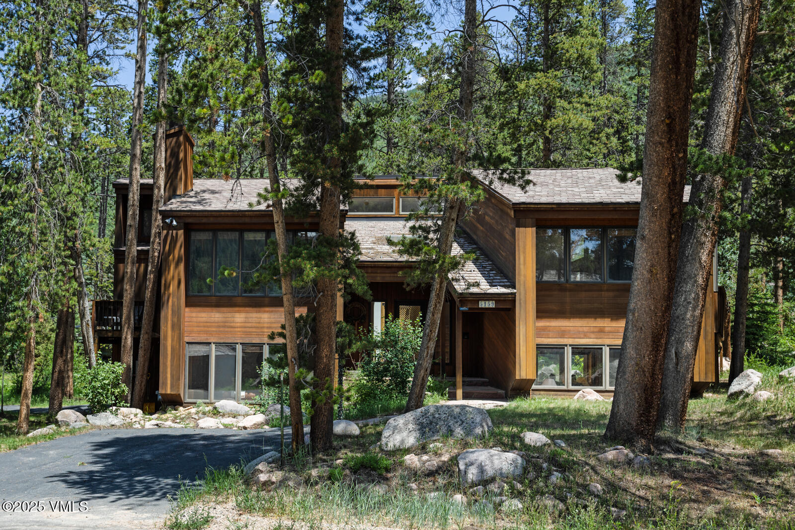 5159 Gore Circle Vail, CO 81657 - Photo 51 of 62 front view of a house with a tree in front