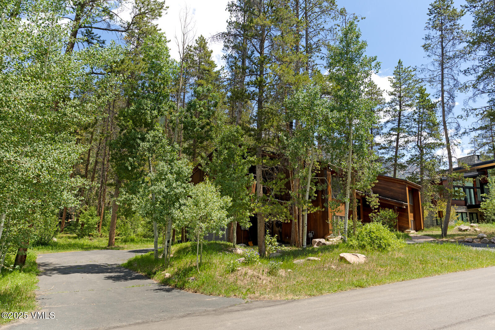 5159 Gore Circle Vail, CO 81657 - Photo 53 of 62 front view of a house with a yard