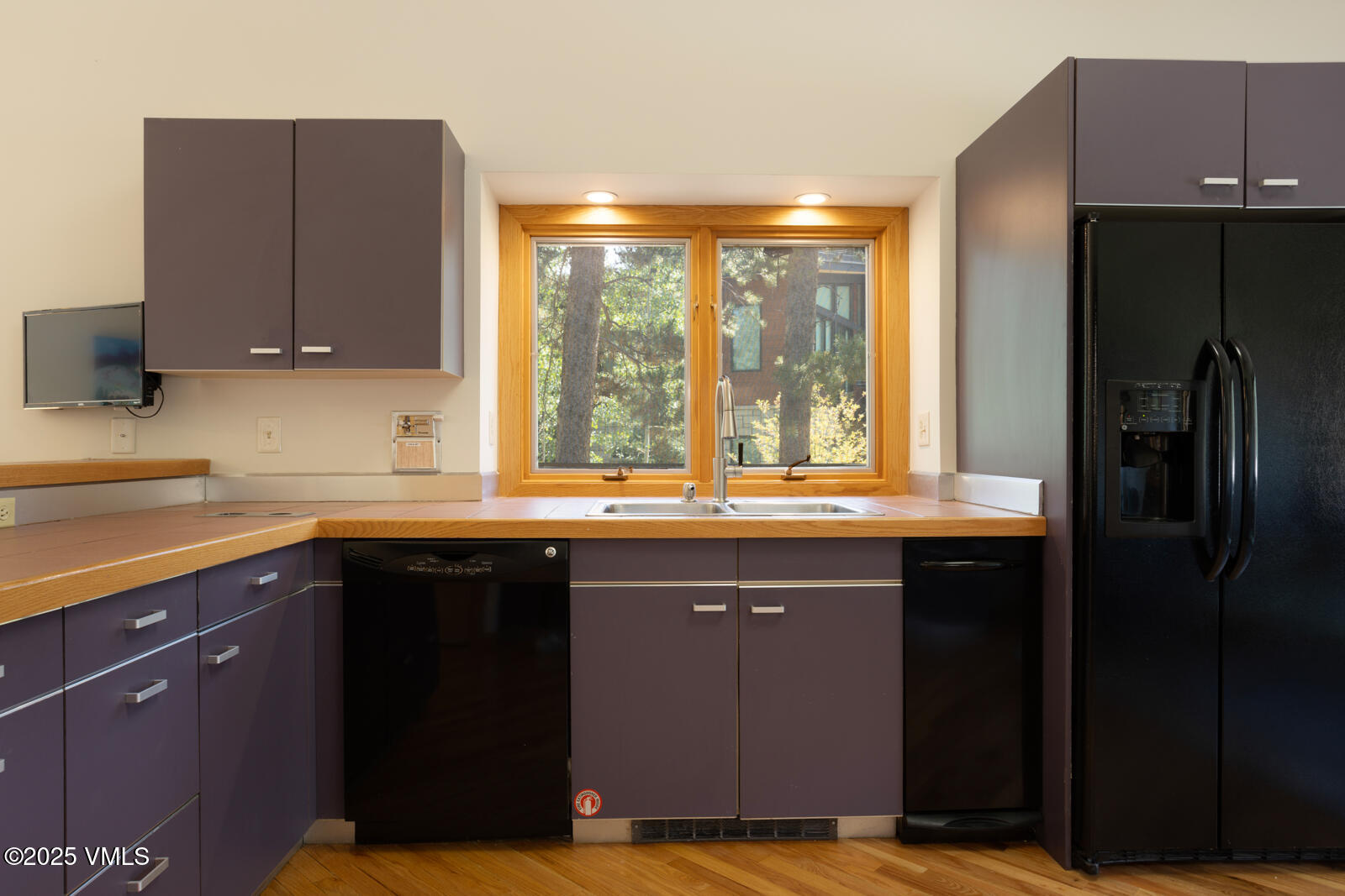5159 Gore Circle Vail, CO 81657 - Photo 8 of 62 a kitchen with a sink a refrigerator and window