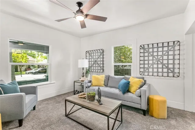 a dining room with furniture and window