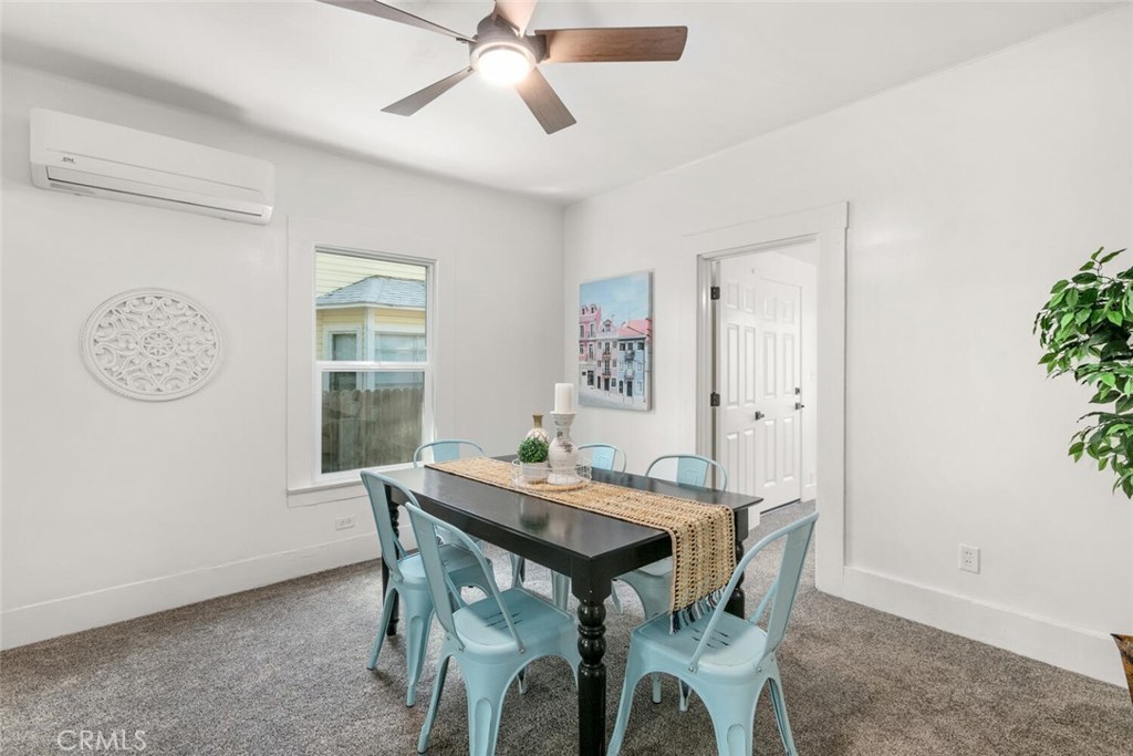 937 Chestnut Street Chico, CA 95928 - Photo 14 of 55 a view of a dining room with furniture window and wooden floor