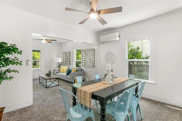 a kitchen with stainless steel appliances granite countertop a sink and a window