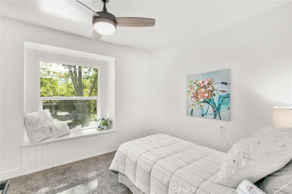 937 Chestnut Street Chico, CA 95928 - Photo 21 of 55 a bedroom with a bed and a window