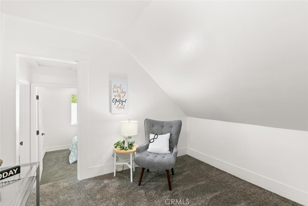 937 Chestnut Street Chico, CA 95928 - Photo 23 of 55 a chair and a table in a room