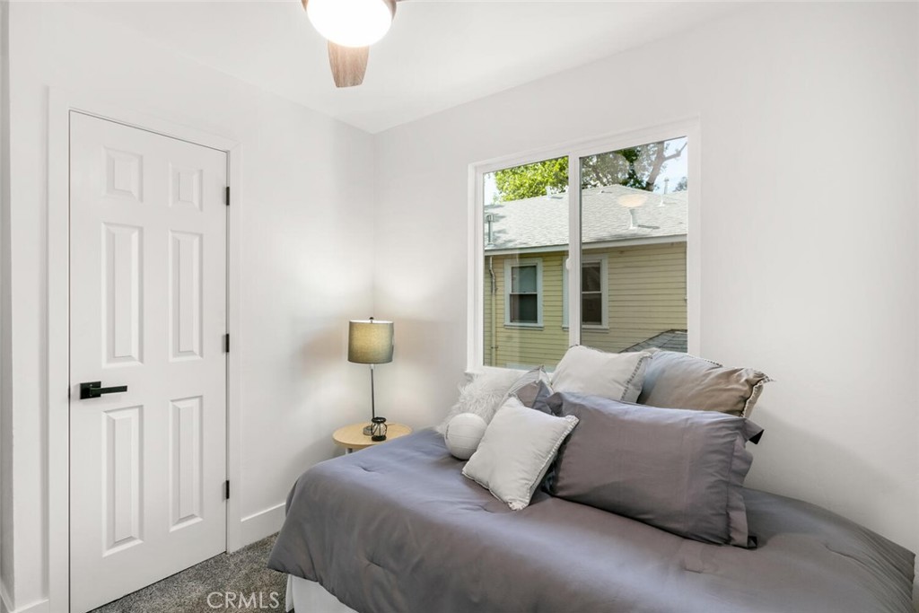 937 Chestnut Street Chico, CA 95928 - Photo 28 of 55 a bedroom with bed and window