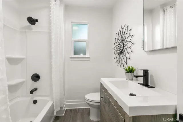 a view of a bathroom with a glass door