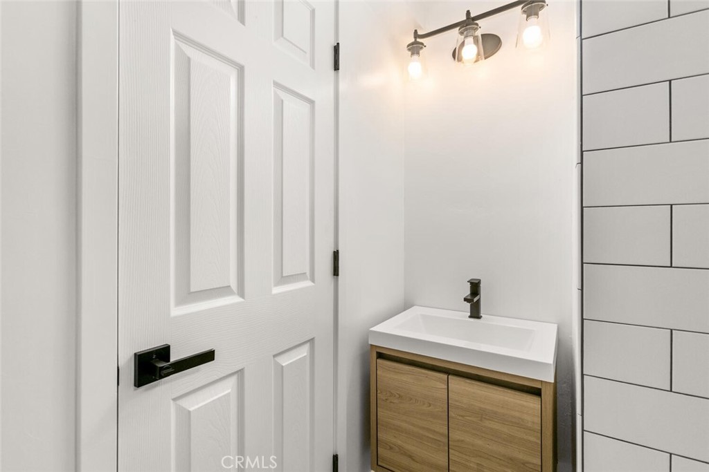 937 Chestnut Street Chico, CA 95928 - Photo 33 of 55 a bathroom with a shower and a sink