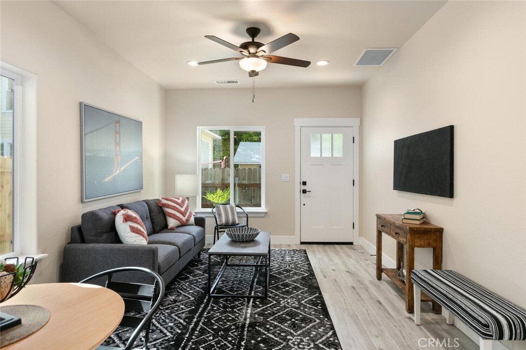 937 Chestnut Street Chico, CA 95928 - Photo 39 of 55 a living room with furniture and a flat screen tv