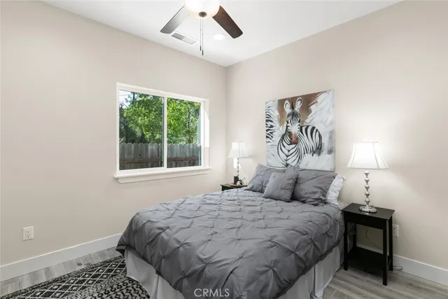 a view of a brick house with stairs and wooden floor