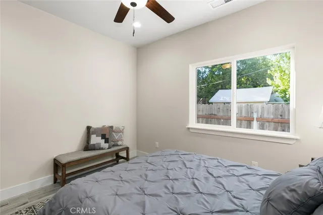 a view of a pathway with a backyard