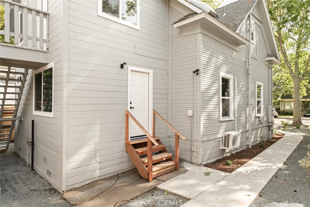 937 Chestnut Street Chico, CA 95928 - Photo 49 of 55 a view of a brick house with stairs and wooden floor