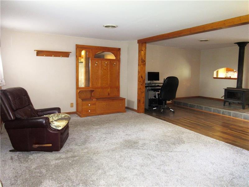118 Grimm Road Sarver, PA 16055 - Photo 8 of 25 Living room wall was removed to really open up the living area.