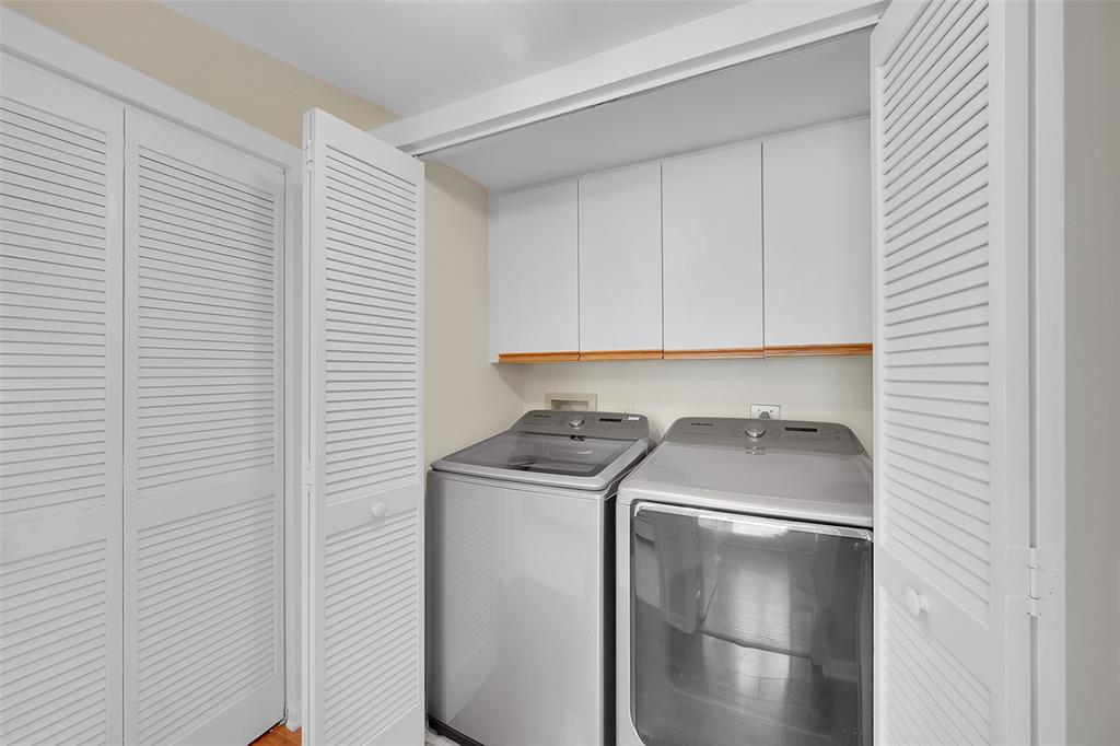 5307 Buckhead Circle, Unit 203 Boca Raton, FL 33431 - Photo 26 of 34 a utility room with dryer and washer