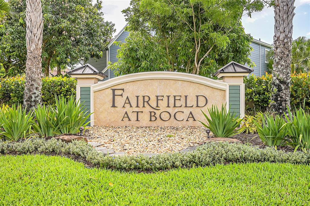 5307 Buckhead Circle, Unit 203 Boca Raton, FL 33431 - Photo 34 of 34 a sign on the side of the road