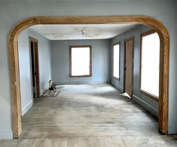 a view of a room with a large window