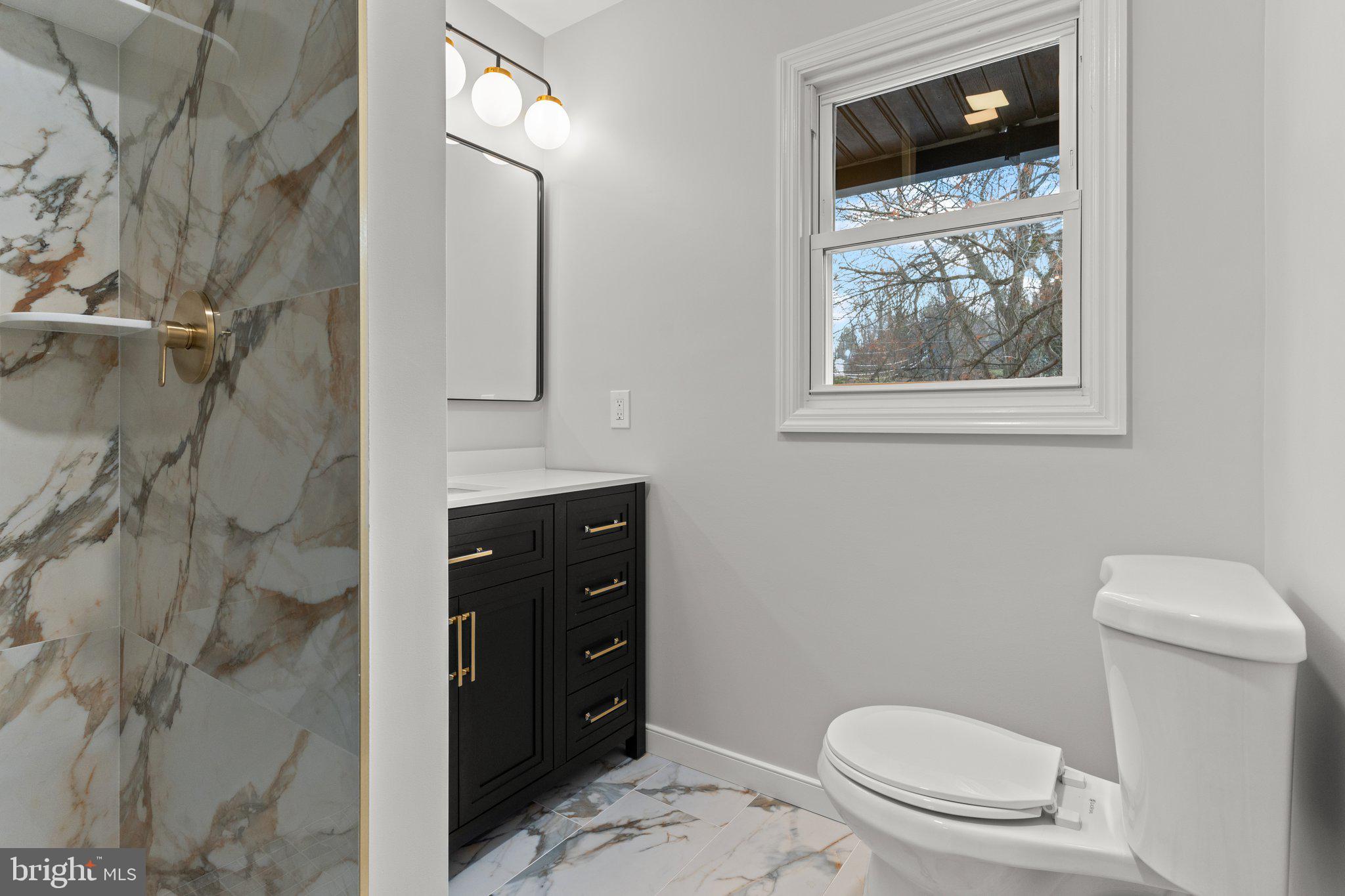 8702 Patton Road Wyndmoor, PA 19038 - Photo 17 of 37 First floor full bathroom