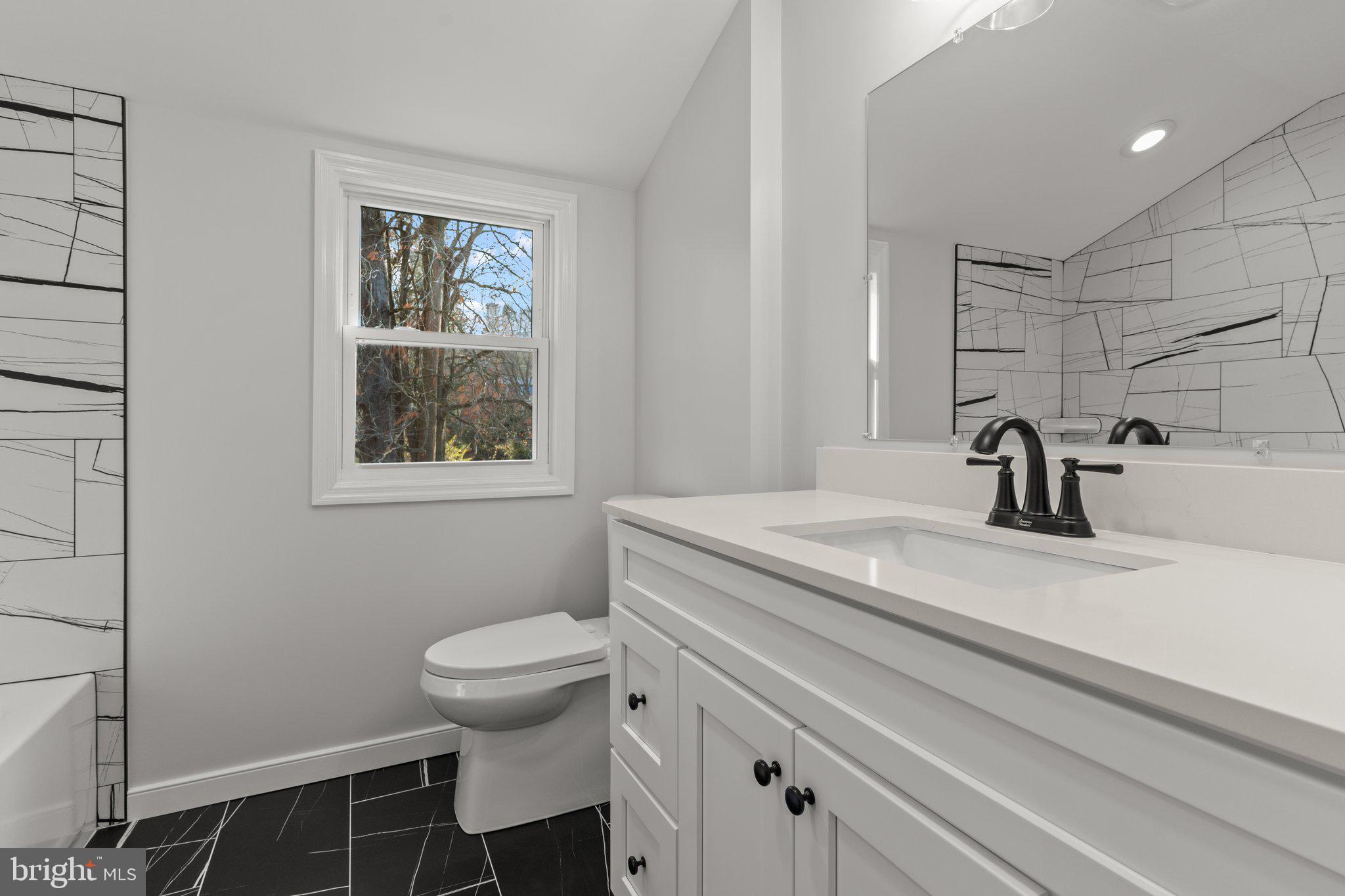 8702 Patton Road Wyndmoor, PA 19038 - Photo 25 of 37 Second floor full bathroom