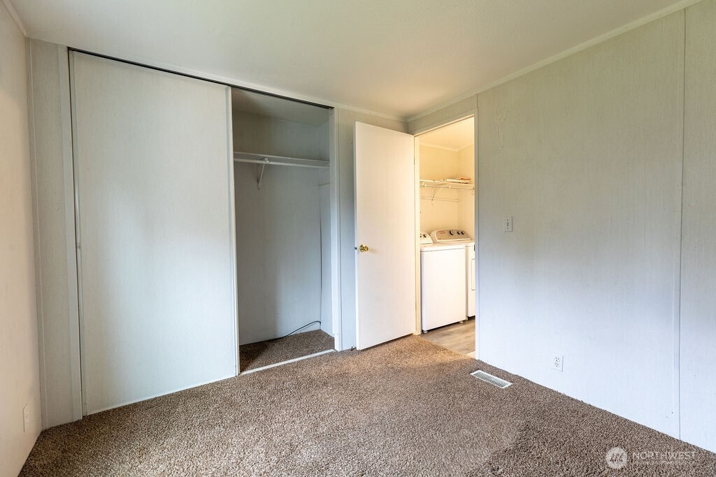 230 Misty Circle Forks, WA 98331 - Photo 6 of 33 a view of an empty room with closet and a window