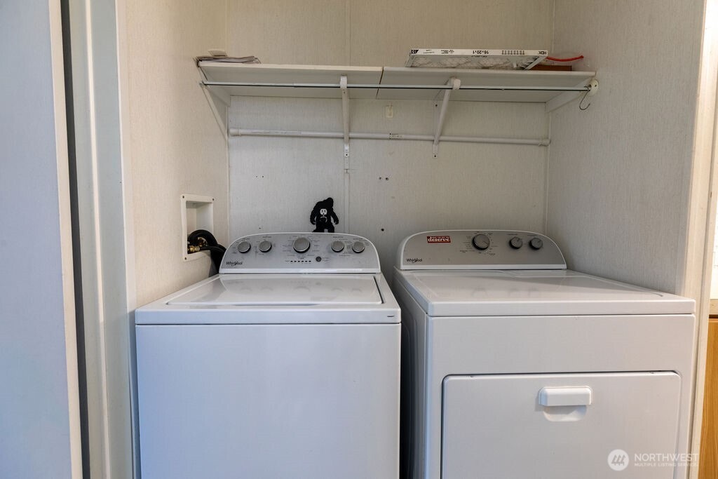 230 Misty Circle Forks, WA 98331 - Photo 7 of 33 a utility room with dryer and washer