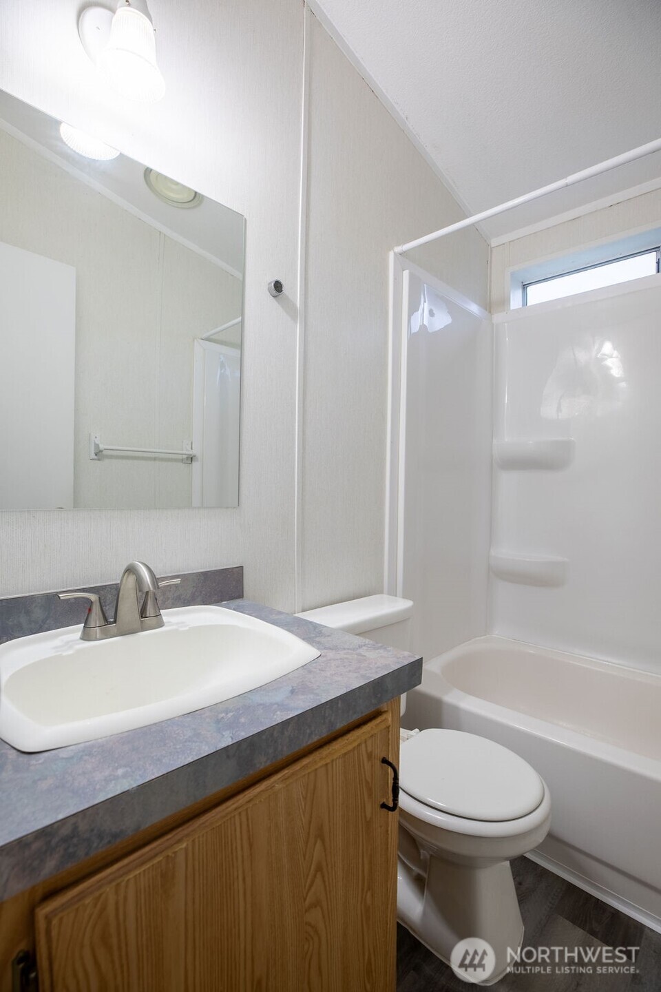 230 Misty Circle Forks, WA 98331 - Photo 9 of 33 a bathroom with a sink a toilet and shower