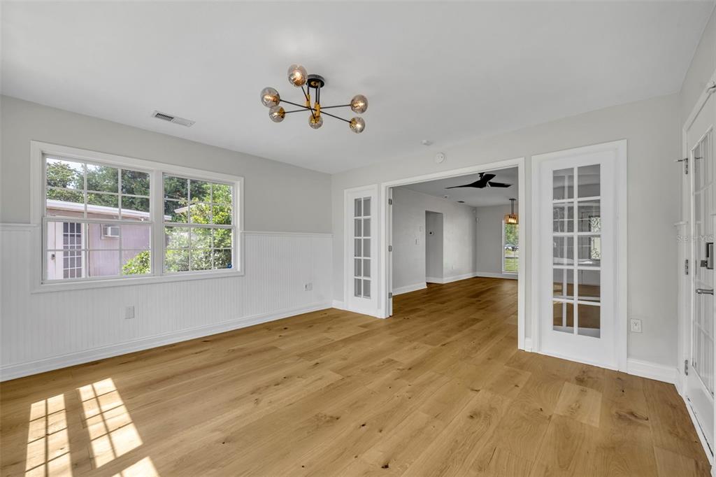 4234 Kendrick Road Orlando, FL 32804 - Photo 22 of 46 a view of empty room with windows