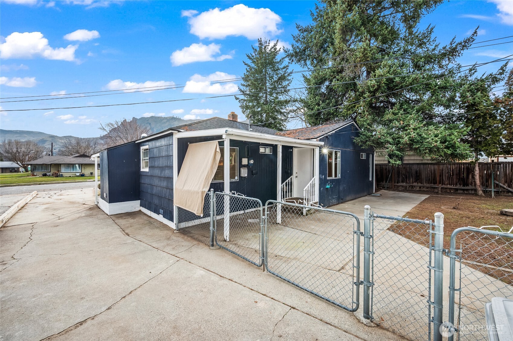 1260 Dakota Street Wenatchee, WA 98801 - Photo 27 of 27 a view of a house with backyard and sitting area
